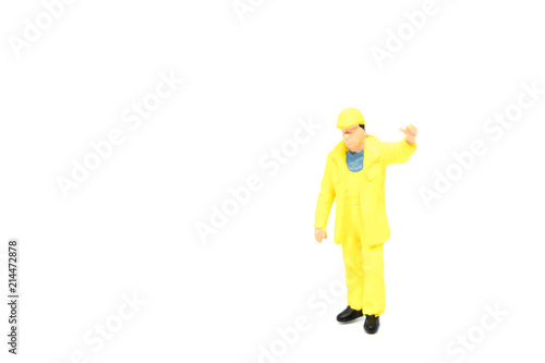 Miniature people engineer worker construction on white background with a space for text