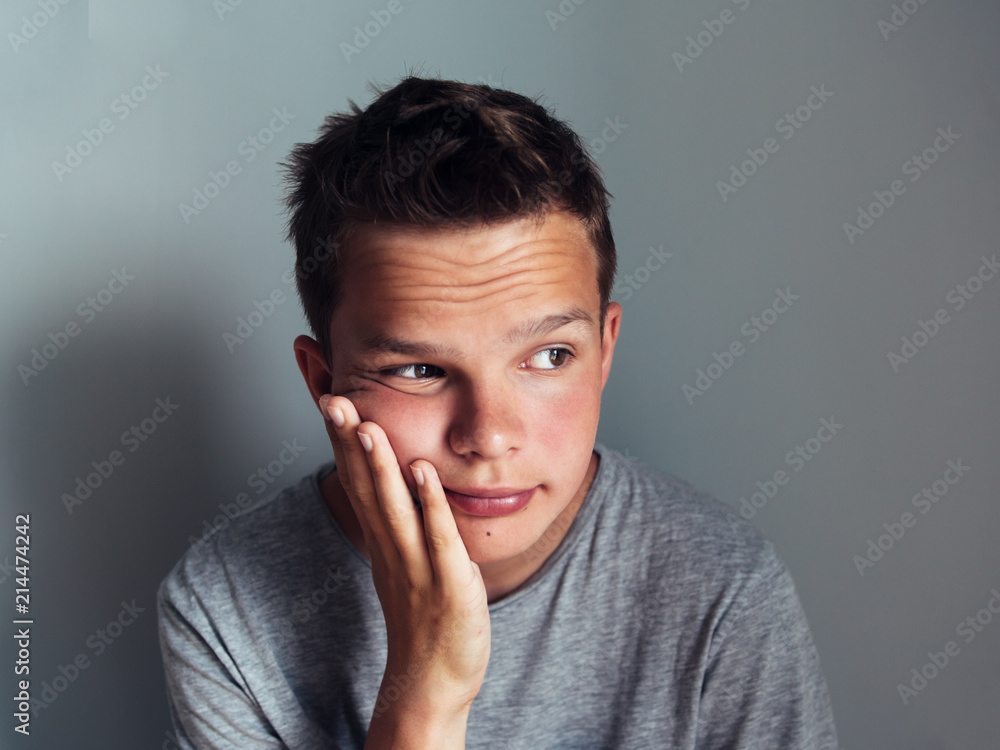 portrait of a serious teenager portrait of a serious teenager