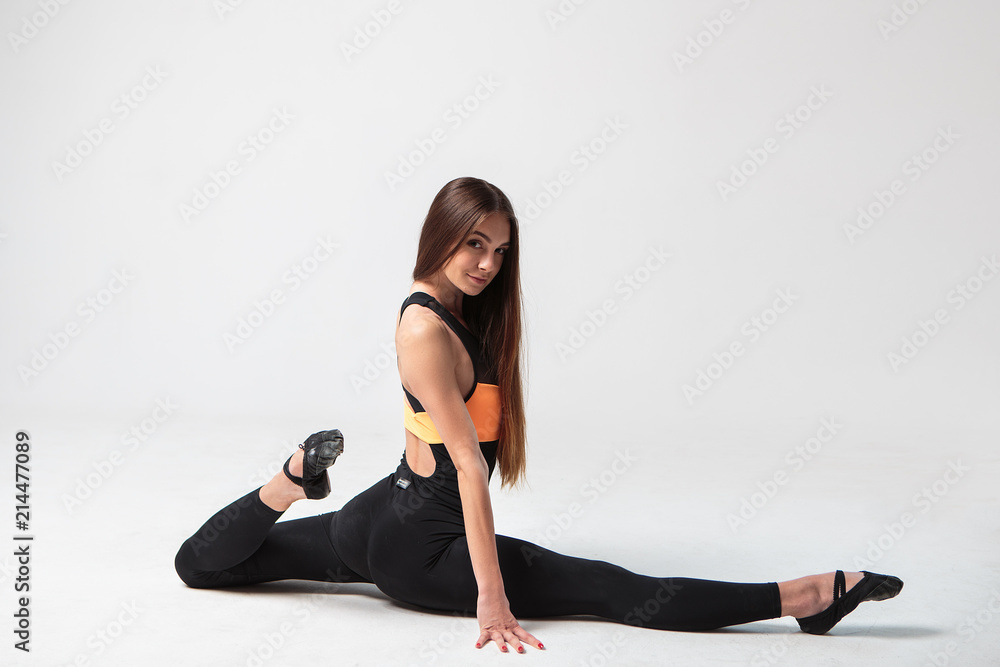 Young woman in a sport casuall costume, fitness model.