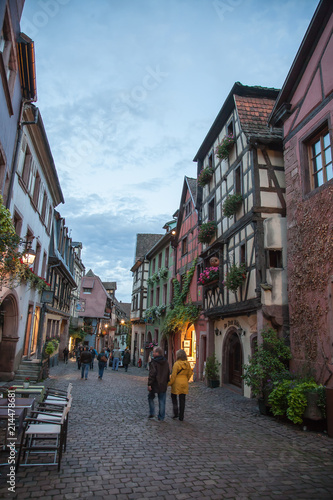 Central square in Riquewihr town, France. Building, arch.