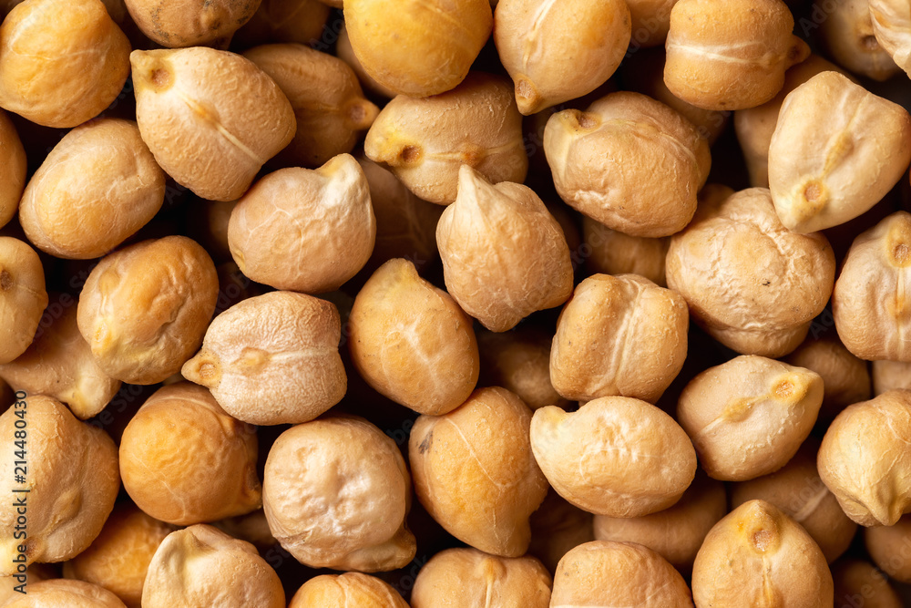 Top view macro chickpea groats as a natural food background. Concept of healthy vegetarian diet. Top view macro chickpea groats as a natural food background. Concept of healthy vegetarian diet.
