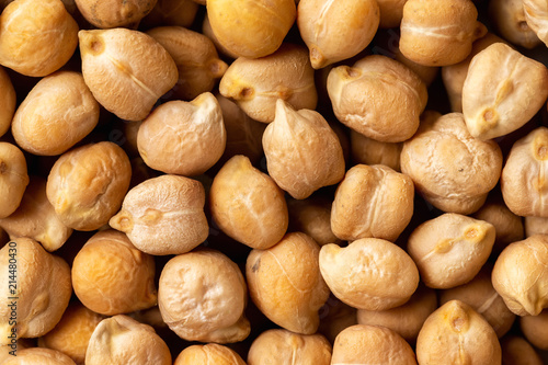 Top view macro chickpea groats as a natural food background. Concept of healthy vegetarian diet.