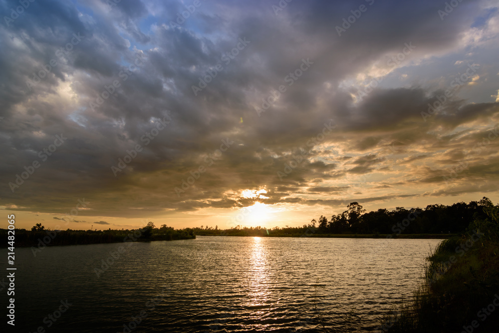 Beautiful orange sky just before sunset with sunbeams Beautiful orange sky just before sunset with sunbeams