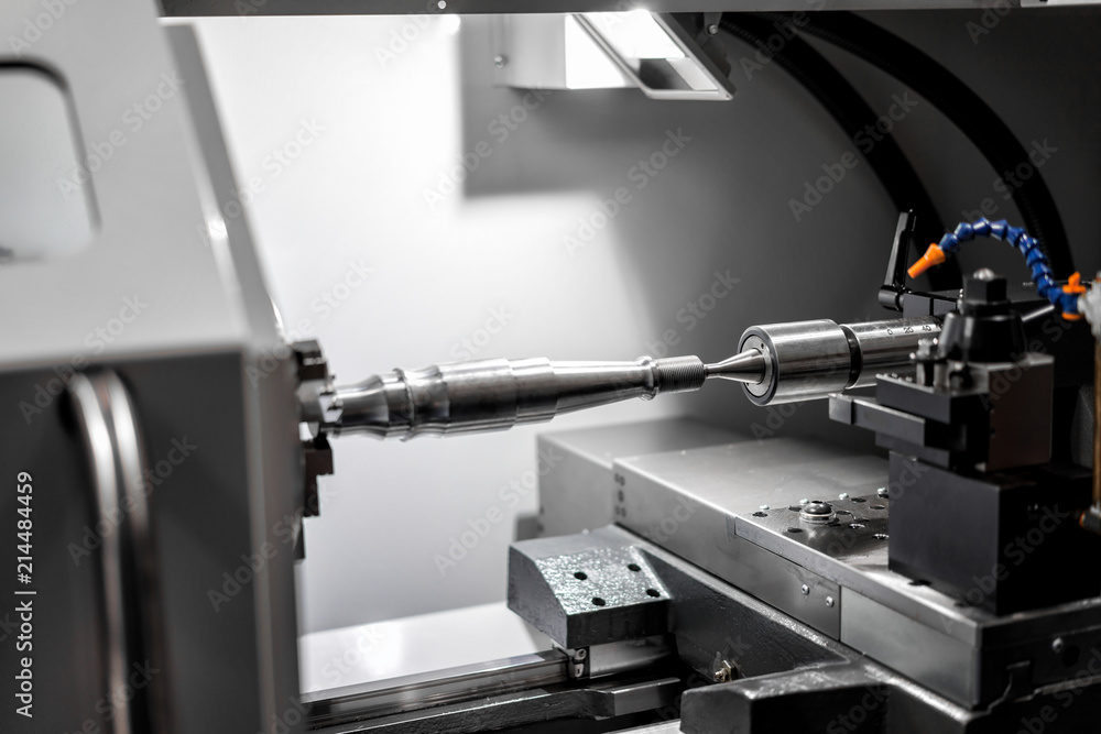 Steel metal automotive parts cutting machine process by CNC lathe in factory Steel metal automotive parts cutting machine process by CNC lathe in factory