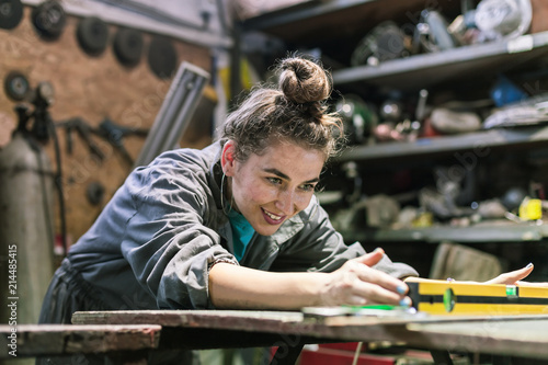 young woman working in workshop