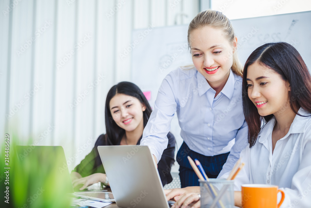 Young business woman working happy smile and relax in office Young business woman working happy smile and relax in office