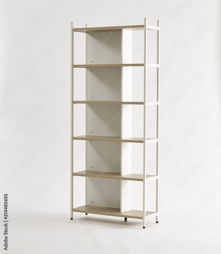 Empty white wood and steel bookshelf isolated on white. minimalism design furniture Empty white wood and steel bookshelf isolated on white. minimalism design furniture