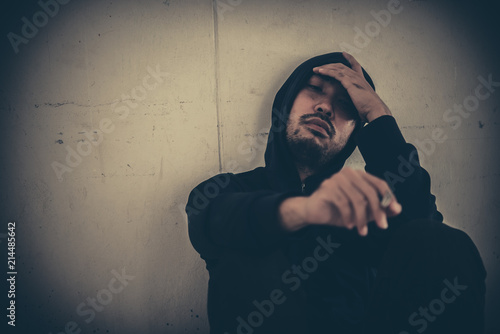 Asian men are drug addicts to inject heroin into their veins themselves.Flakka drug or zombie drug is dangerous life-threatening,Thailand no to drug concept,The bad guy drugs in the desolate