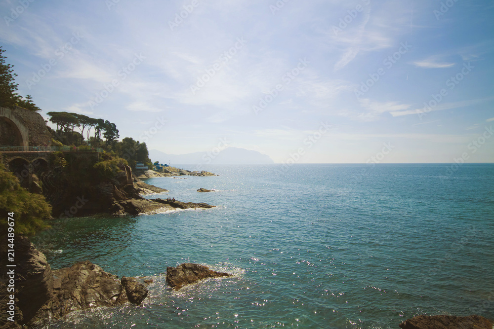 Panoramic view of the Tigullio gulf from the sea promenade  on the rocky coast of Genoa Nervi, Liguria, Italy