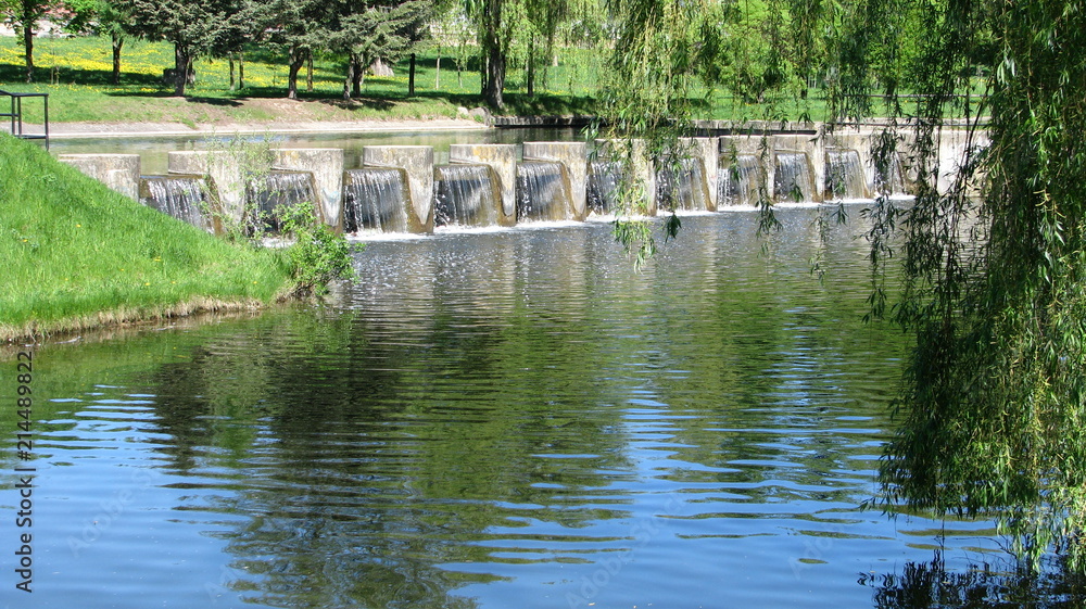 Obraz premium Waterfall on the city channel. Minsk.