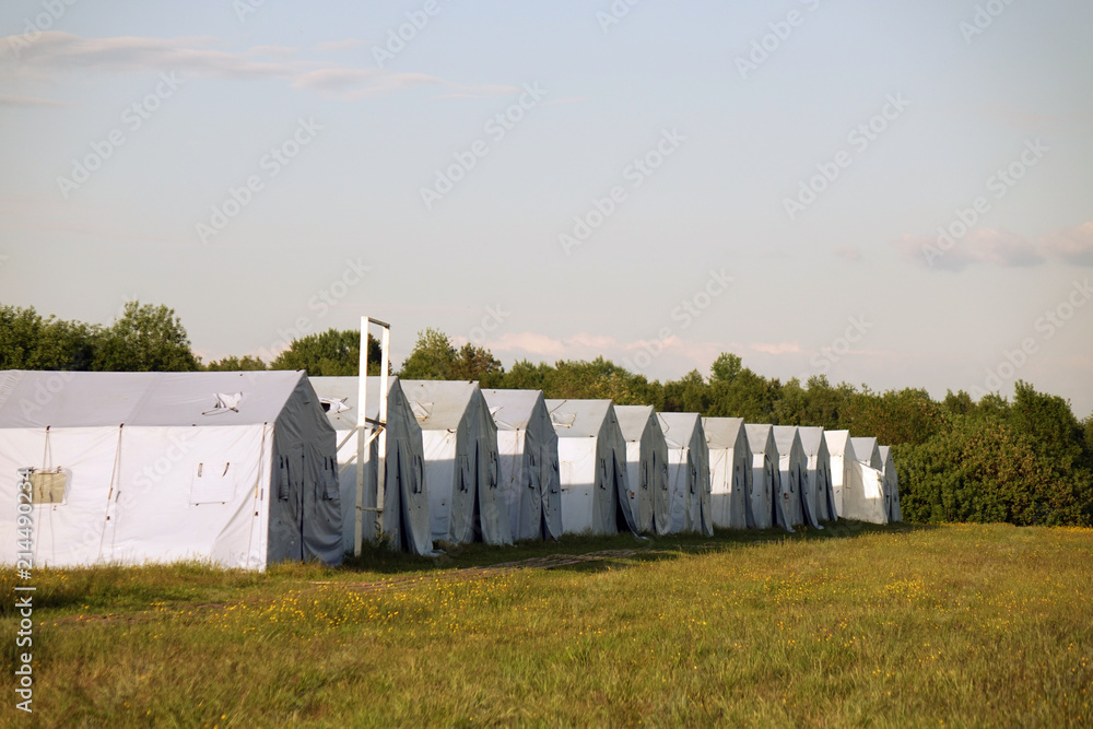 white large army tents. rescue camp.