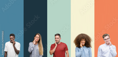 Group of people over vintage colors background touching mouth with hand with painful expression because of toothache or dental illness on teeth. Dentist concept.