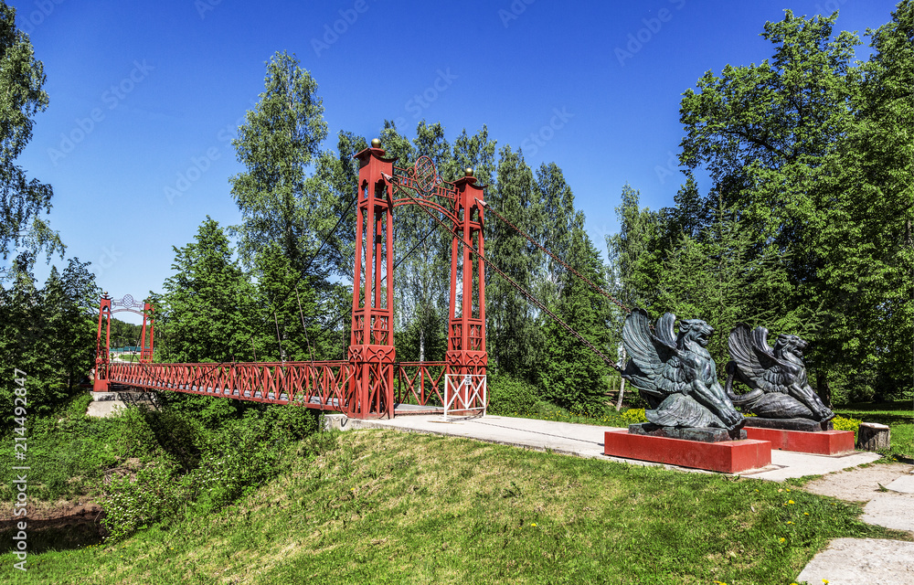 Pedestrian bridge over the river Tosna in manor Pedestrian bridge over the river Tosna in manor