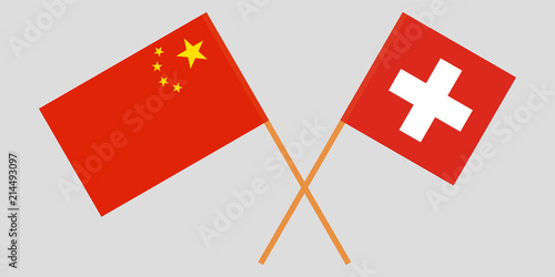 The crossed China and Switzerland flags. Official colors. Vector