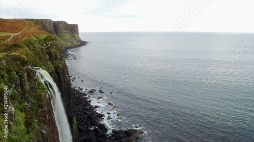 Panning of a Waterfall Over Oisgill Bay Near Neist Point Scotland photo