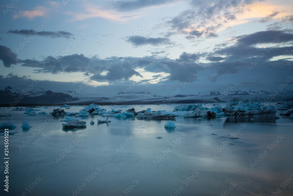 Iceland - Turquoise ice floes moving to the ocean in glacier lagoon