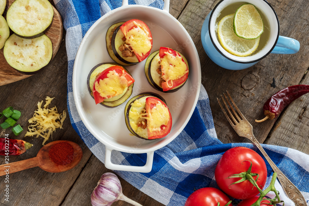 Gratin eggplant with minced meat, tomatoes and cheese. Gratin eggplant with minced meat, tomatoes and cheese.