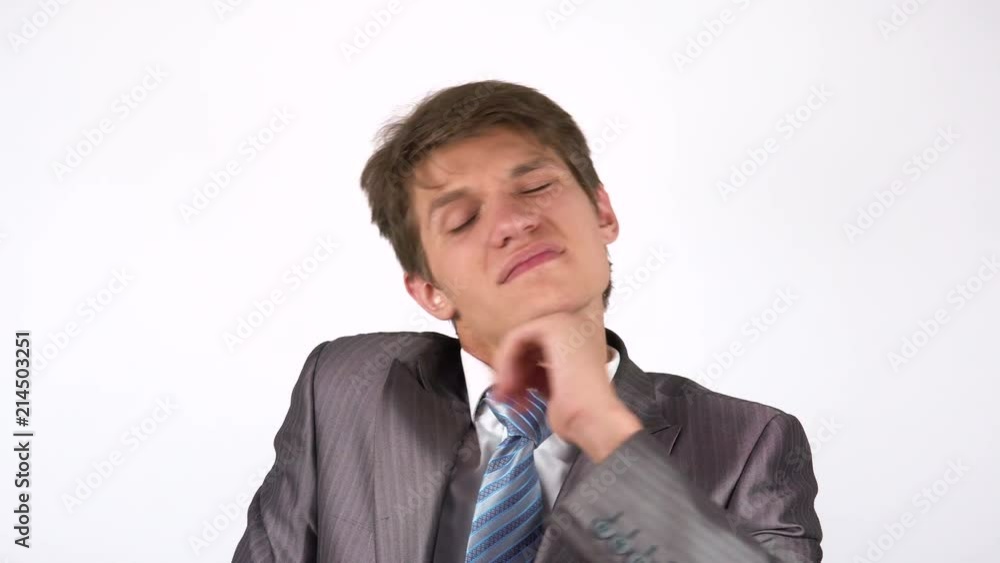 Young businessman with pain in the neck joint Young businessman with pain in the neck joint