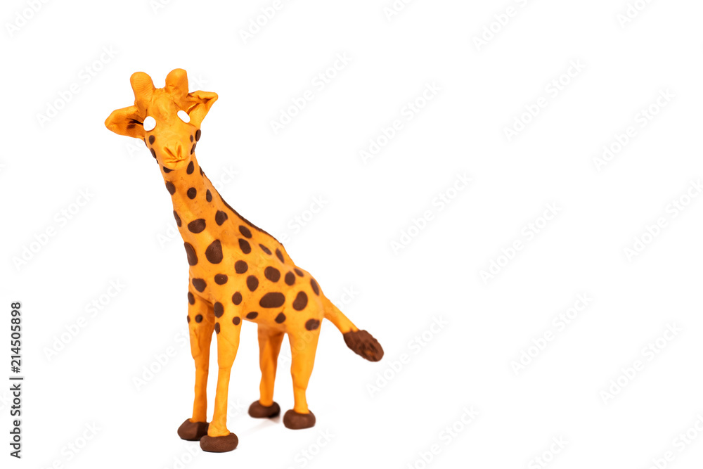 Fototapeta premium Plasticine artwork. Handmade giraffe. Abstract isolated photo.