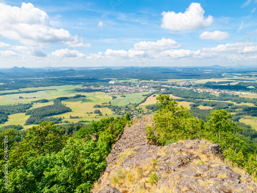 Rural landscape around Mimon on sunny summer day, view from Ralsko mountain, Czech Republic. photo