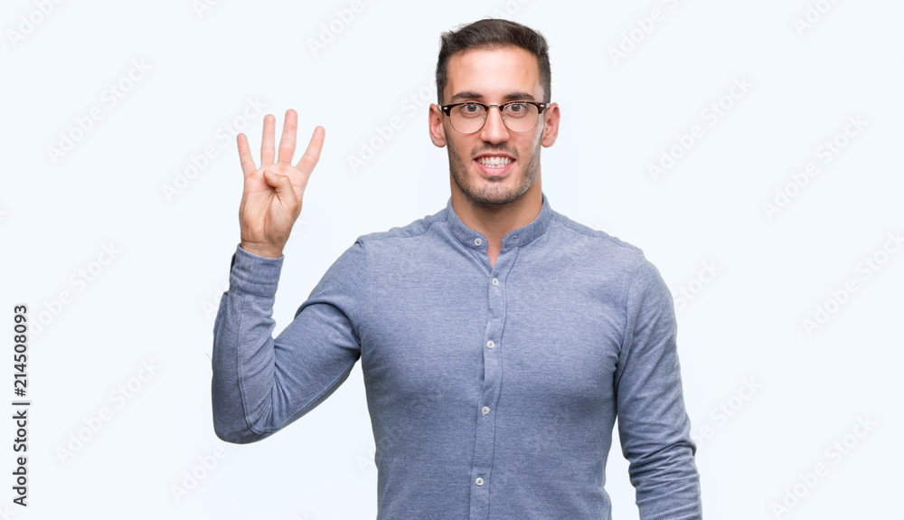 Handsome young elegant man wearing glasses showing and pointing up with fingers number four while smiling confident and happy. Handsome young elegant man wearing glasses showing and pointing up with fingers number four while smiling confident and happy.