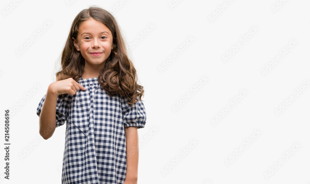 Brunette hispanic girl wearing black and white dress with surprise face pointing finger to himself Brunette hispanic girl wearing black and white dress with surprise face pointing finger to himself