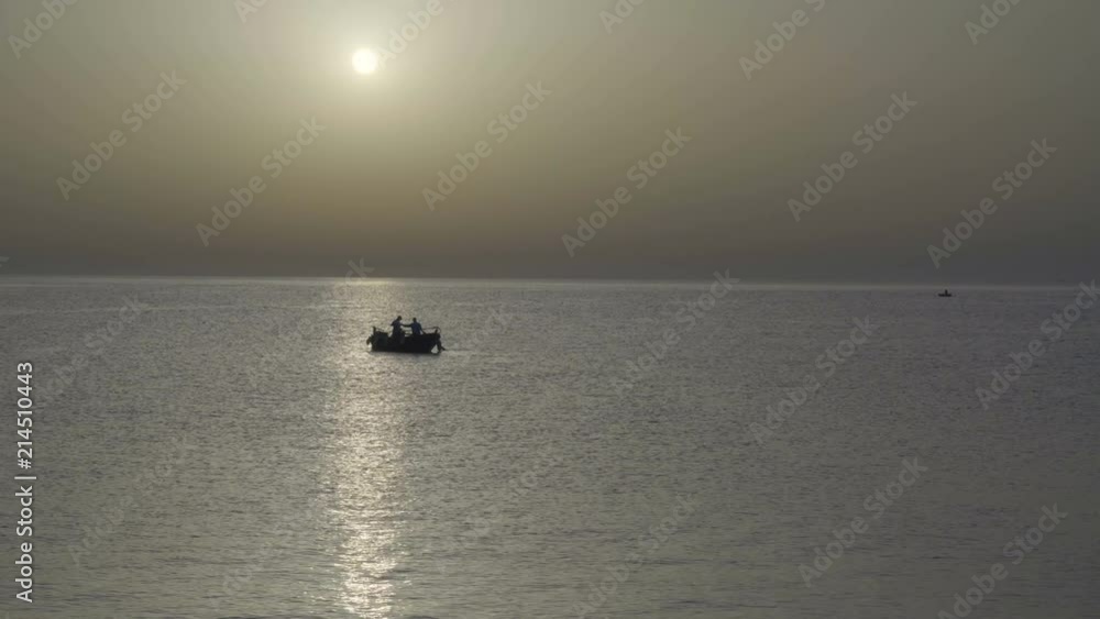 Fisherman on Fishing boat, sunset, sunrise Fisherman on Fishing boat, sunset, sunrise