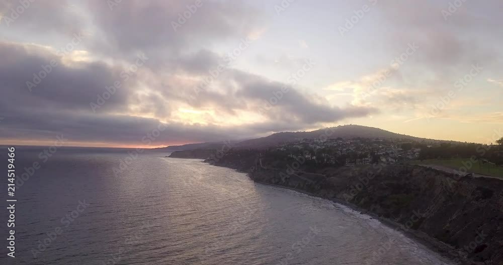 Aerial shot dolly in of San Pedro shoreline, during summer sunset. Aerial shot dolly in of San Pedro shoreline, during summer sunset.