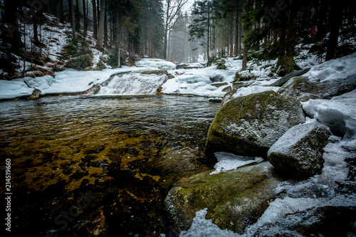 Large Snowy Boulders on the Banks of the Mumlava River