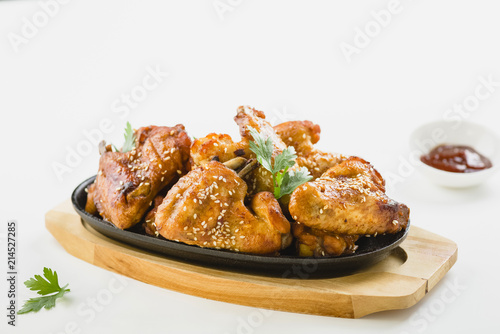 chicken wings with sesame on white background