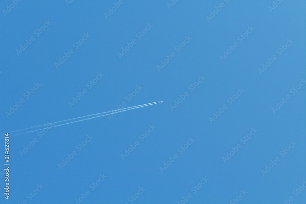 Passenger airplane flying in the sky. View diagonally. Background. Texture. Passenger airplane flying in the sky. View diagonally. Background. Texture.