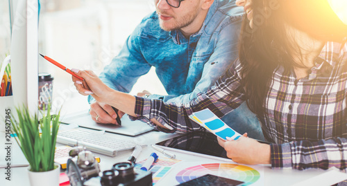 Canvas Print Cute creative designers working on new project in modern office