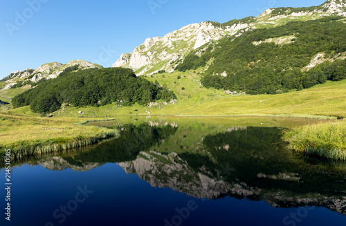 Beautiful mountain reflection on lake.Crystal clear reflection of mountains in the lake