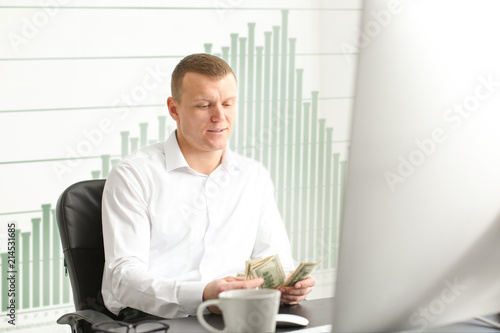Financial trader counting m...