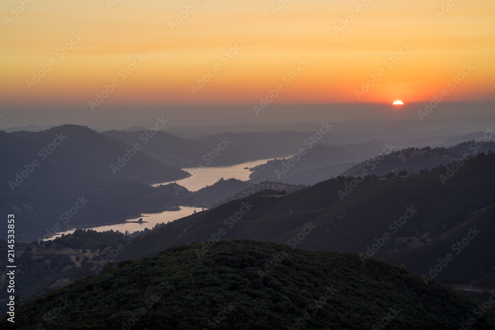 Orange Setting Sun Over Don Pedro Reservoir, in California's Sierra Foothills