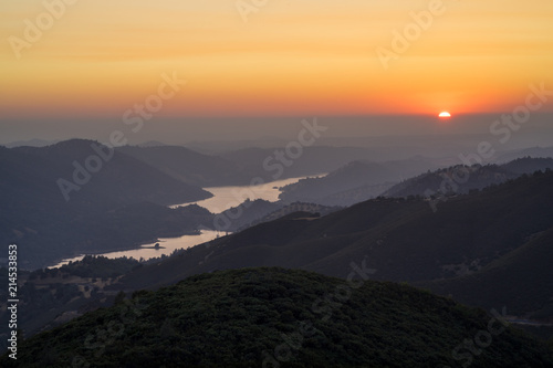 Orange Setting Sun Over Don Pedro Reservoir  in California s Sierra Foothills