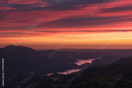 Stunning Mountain Sunset With Pink Clouds and Don Pedro Lake Reflection