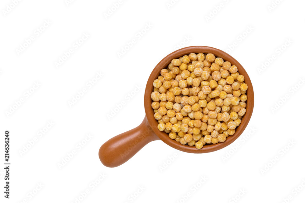 Dry yellow peas in a bowl isolated on white background. Dry yellow peas in a bowl isolated on white background.