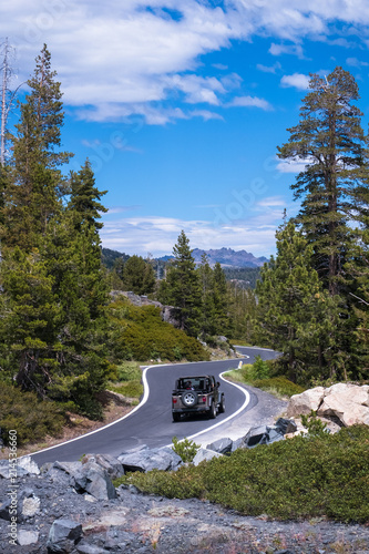 Tourists Driving a Truck up a Scenic Mountain Road - Ebbetts Pass photo