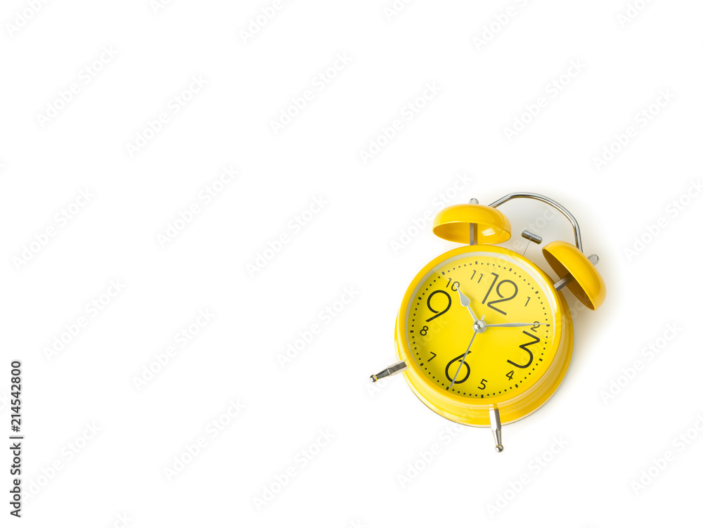 Yellow alarm Clock analog classic retro style on white background , Top view and copy space.