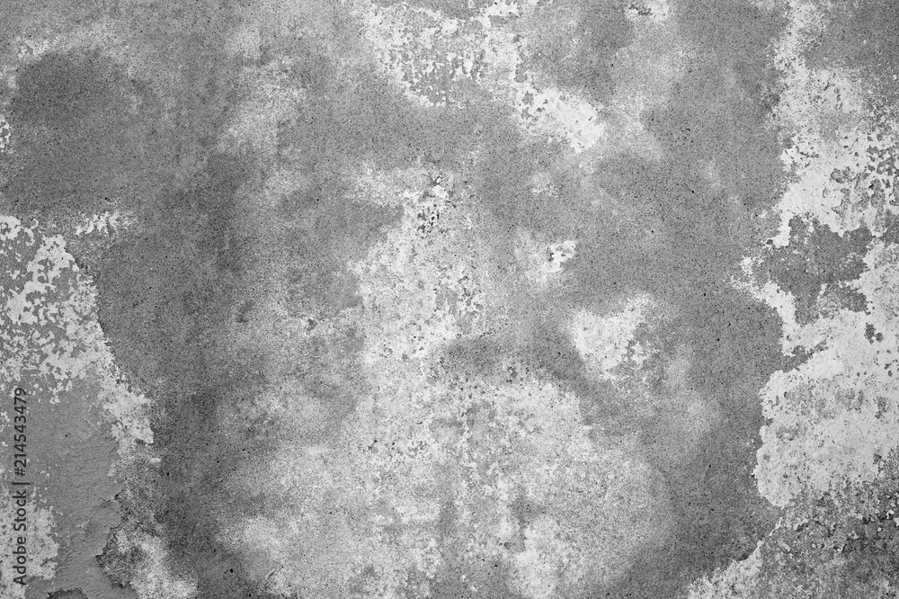 Old concrete wall with remnants of peeling paint. Background, retro, texture. Black and white image. Old concrete wall with remnants of peeling paint. Background, retro, texture. Black and white image.