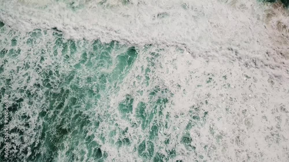 cool green waves crashing, drone from above cool green waves crashing, drone from above