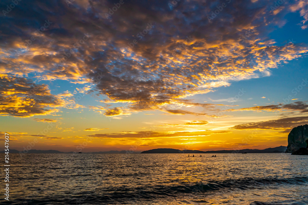 Obraz premium Sunset at beach sea sky clouds twilight time