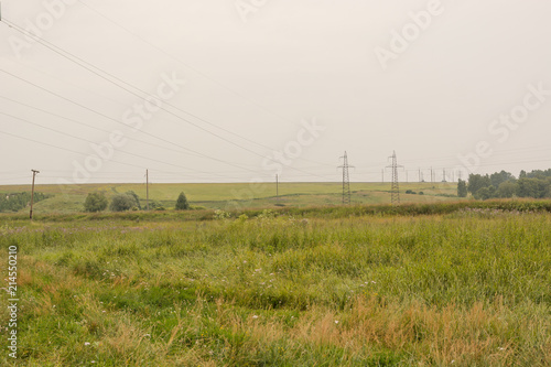 The high-voltage line passes through the field