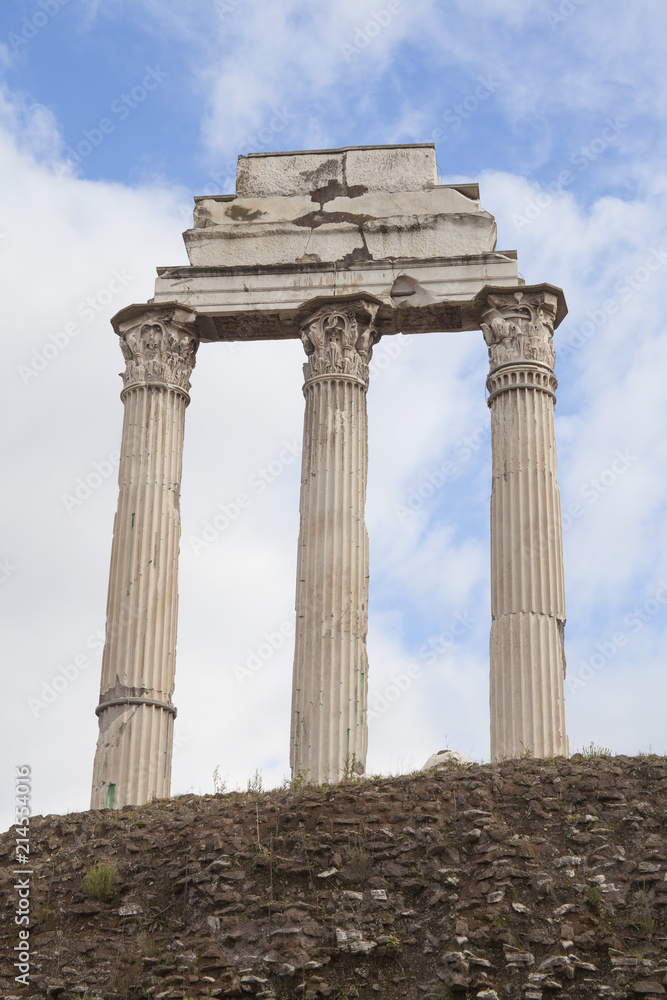 old marble ruins of columns in Rome city, Italy