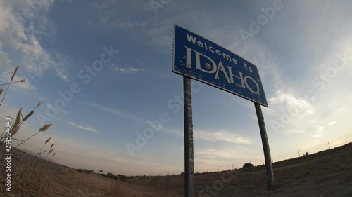 Idaho State Welcome Sign (Time Lapse) on interstate 84 Leaving Utah. photo