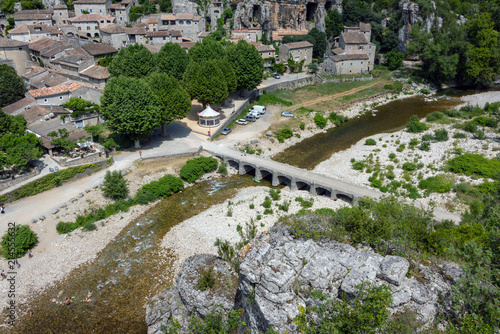 View from the viewpoint to the Ardeche, the stone bridge over the Ardeche and the medieval village Labeaume in France