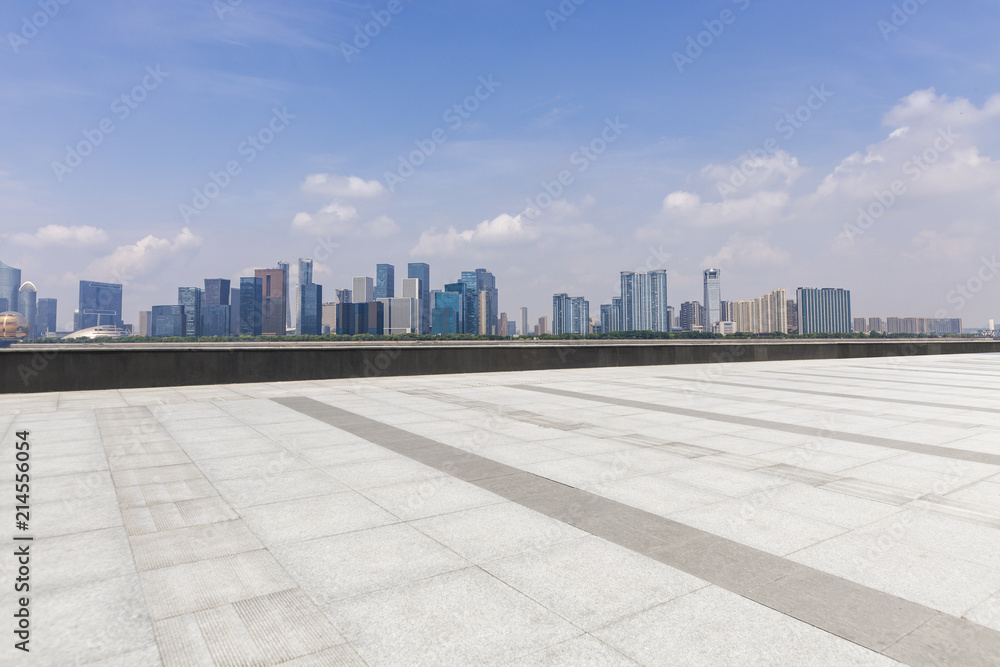 Panoramic skyline and modern business office buildings with empty road,empty concrete square floor