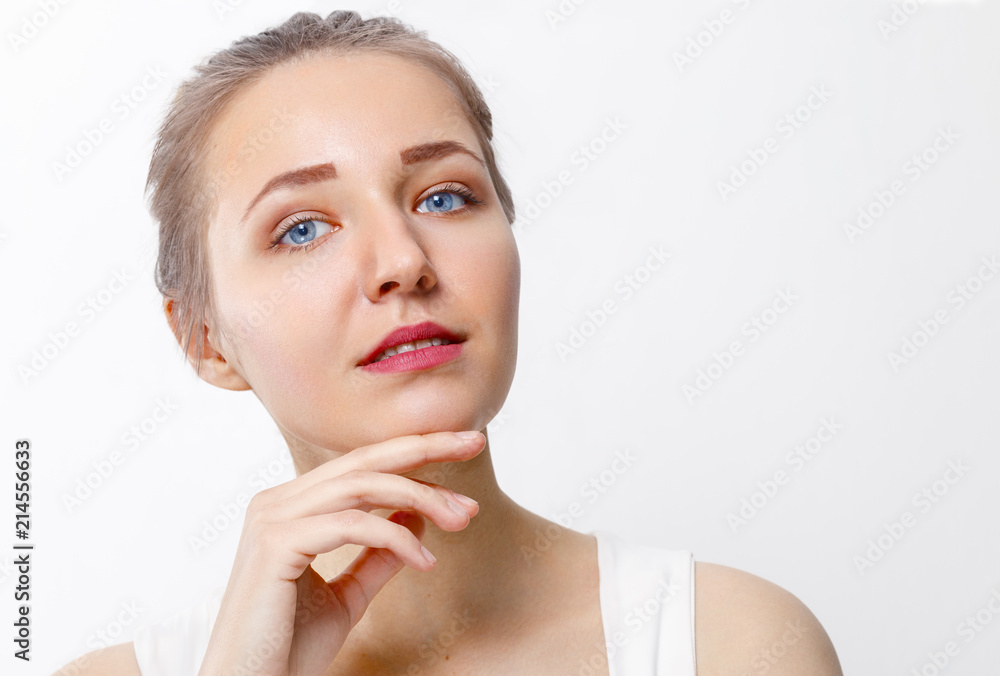 Pretty young girl with make-up poses in white studio, close up portrait Pretty young girl with make-up poses in white studio, close up portrait