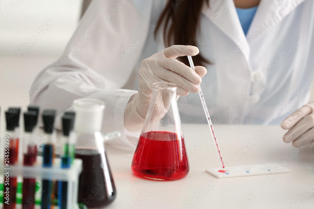 Female scientist working in laboratory, closeup Female scientist working in laboratory, closeup